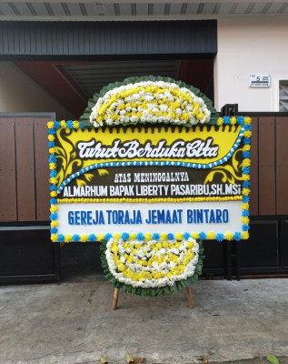 Papan Bunga Duka di Palasari Hilir